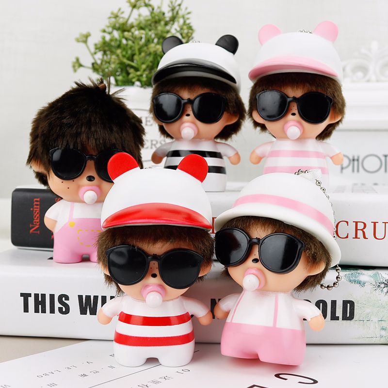 Striped monchichi doll with hat