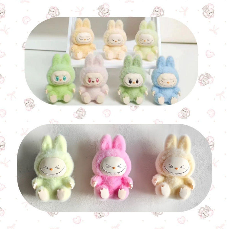 fluffy sitting labubu