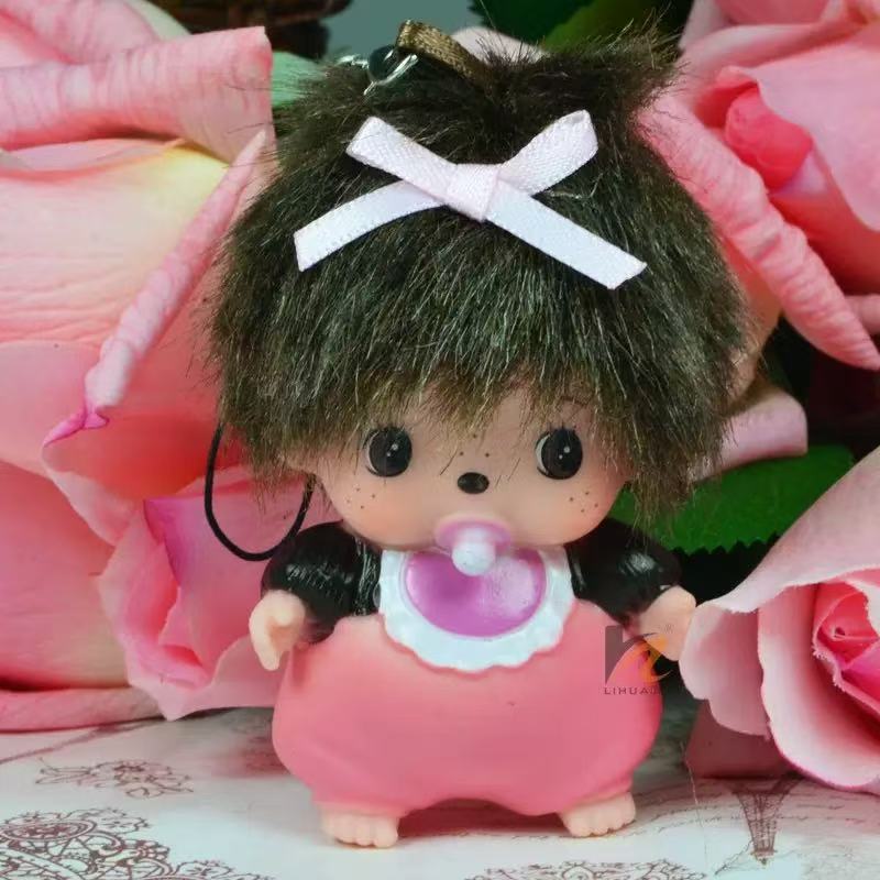Striped monchichi doll with hat