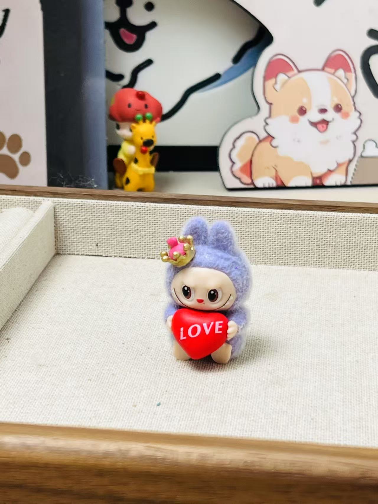 fluffy sitting labubu