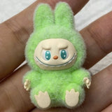 fluffy sitting labubu