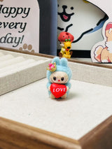 fluffy sitting labubu