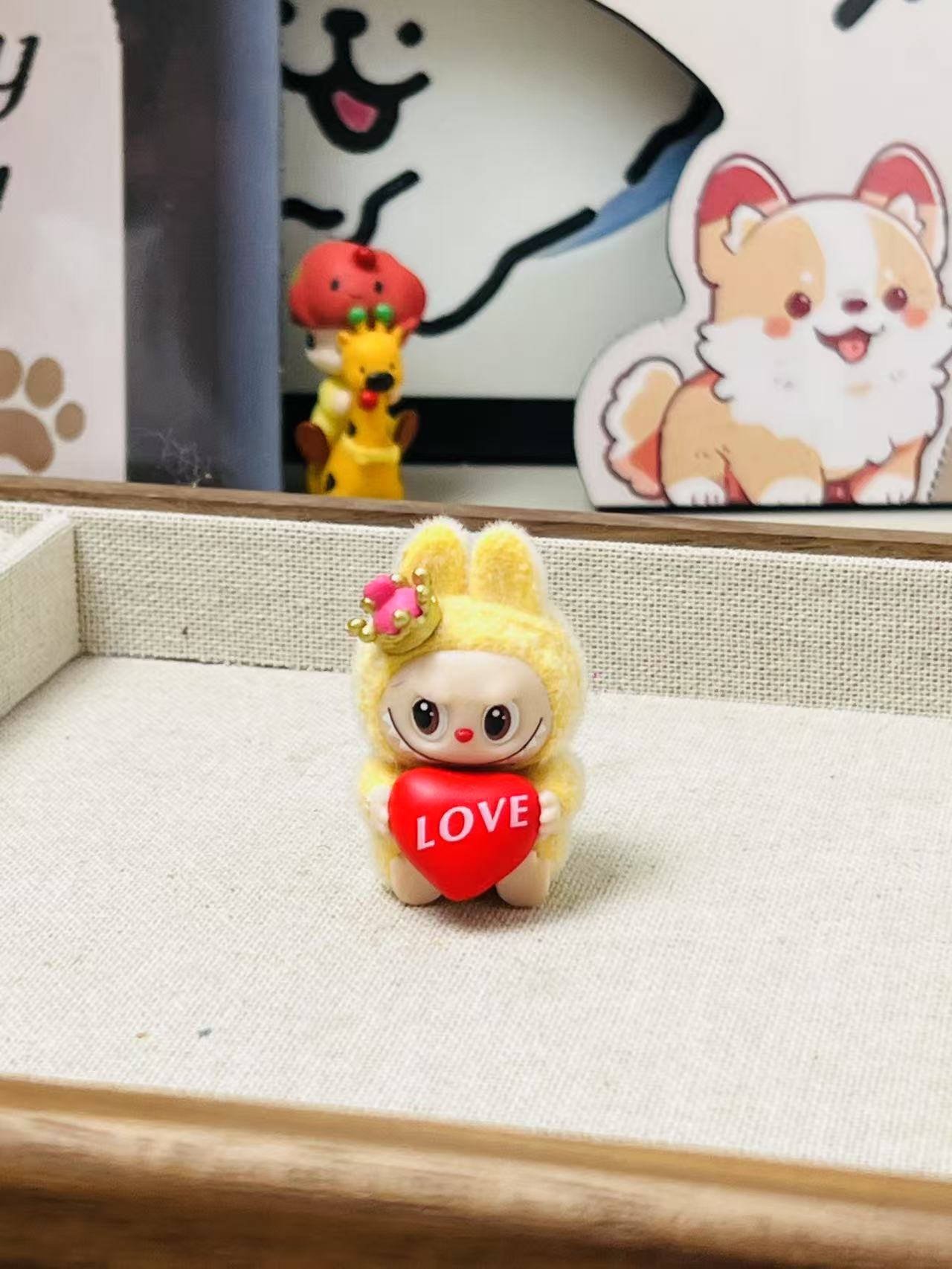 fluffy sitting labubu