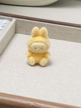 fluffy sitting labubu