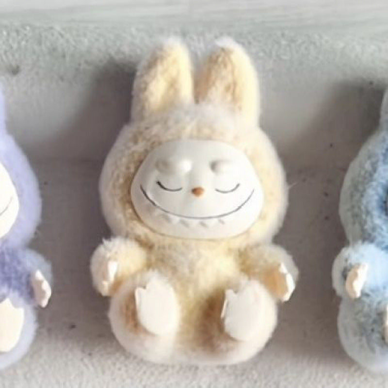 fluffy sitting labubu