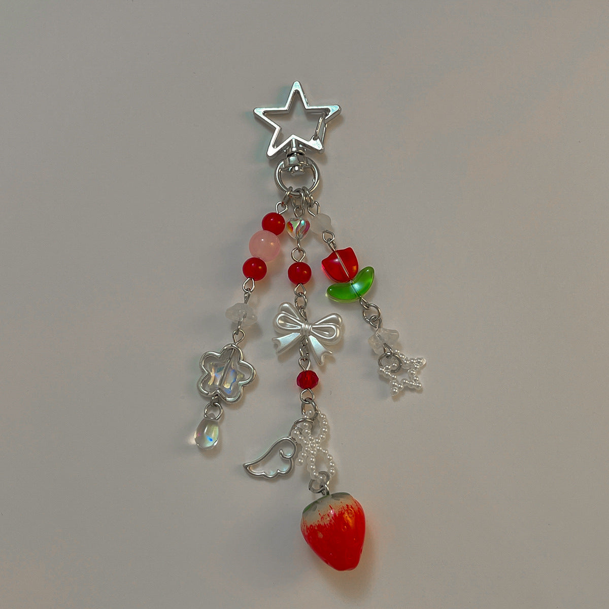 Love-shaped strawberry pendant, keychain, mobile phone chain, lanyard.
