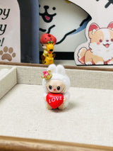 fluffy sitting labubu