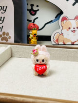 fluffy sitting labubu