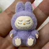 fluffy sitting labubu