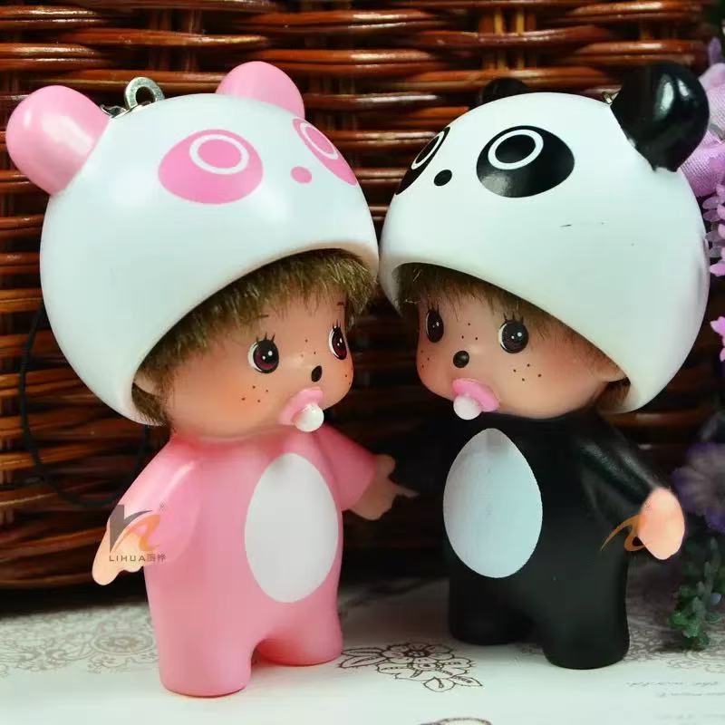 Striped monchichi doll with hat